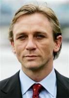 Daniel Craig actor with medium long haircut
