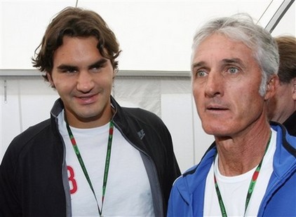 Roger Federer with wavy curly medium hairstyle_Federer with his coach Jose Higueras.jpg

