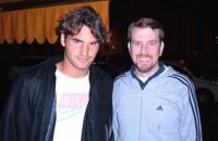Roger Federer with curly hairstyle and curly side bangs.jpg
