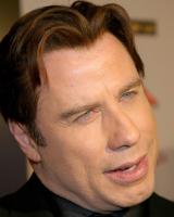 John Travolta with short hair and long side bangs.jpg
