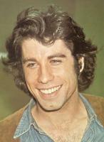 young John Travolta with medium curly hair.jpg
